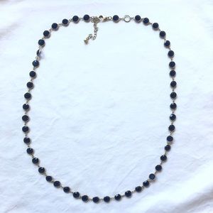 Blue and gold beaded necklace